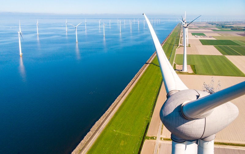 Wind turbine from aerial view, Drone view at windpark westermeerdijk a windmill farm in the lake IJsselmeer the biggest in the Netherlands,Sustainable development, renewable energy